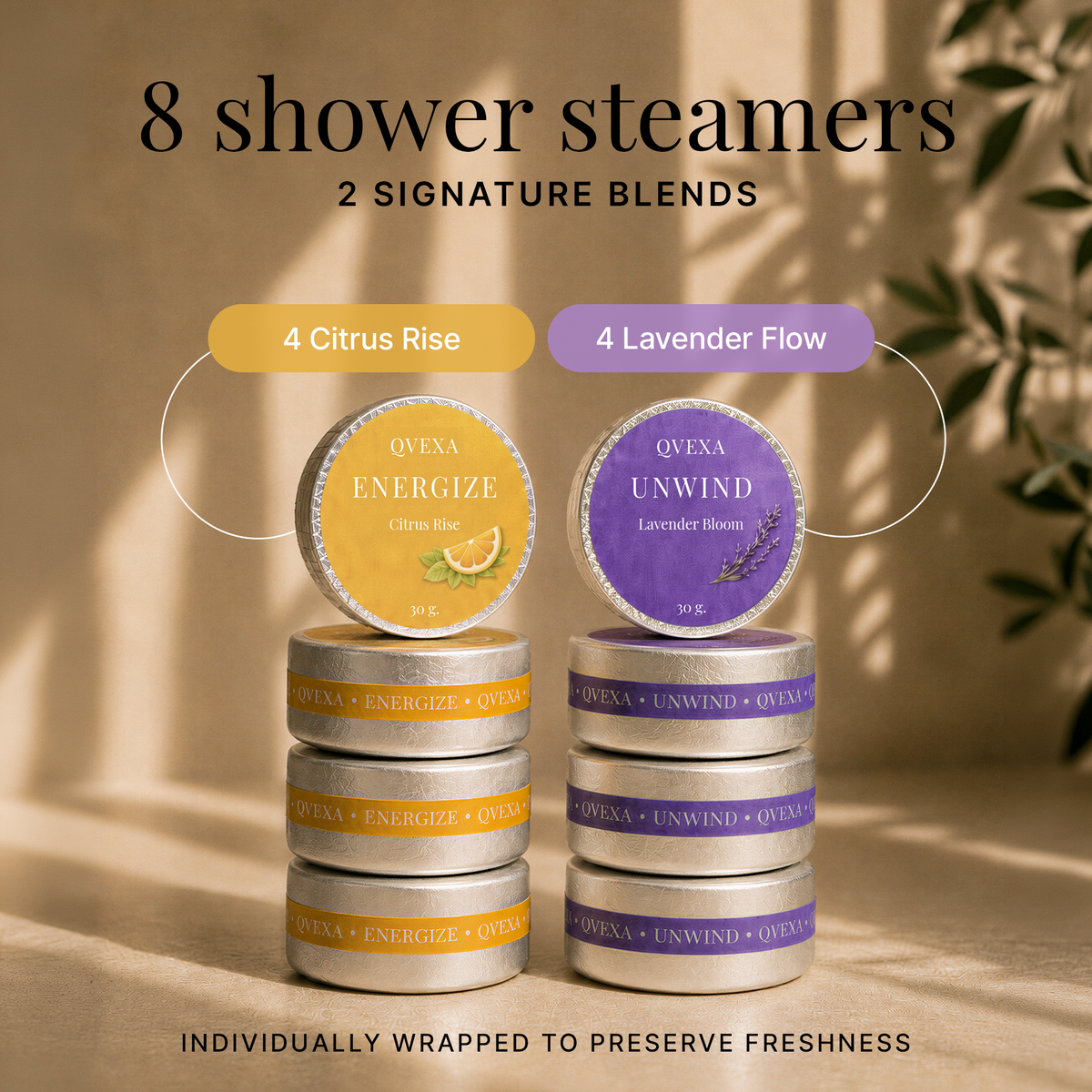 Eight QVEXA shower steamers in two signature blends: 4 Citrus Rise and 4 Lavender Flow. The image shows two stacks of individually wrapped silver tins, one with yellow-orange labels and one with purple labels, set against a warm beige background with soft shadows and decorative leaves.